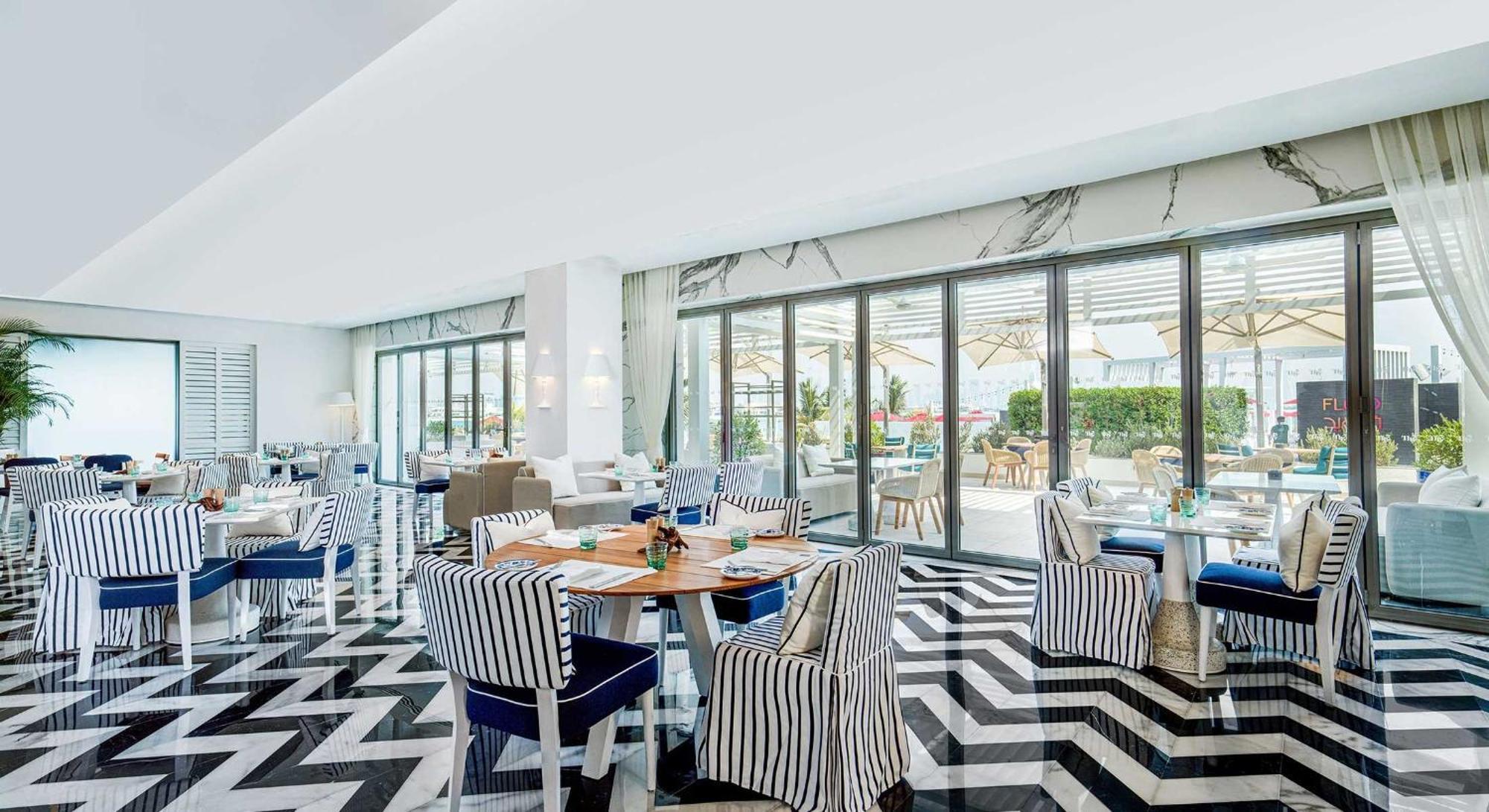 Th8 Palm Dubai Beach Resort, Vignette Collection By Ihg מראה חיצוני תמונה Restaurant