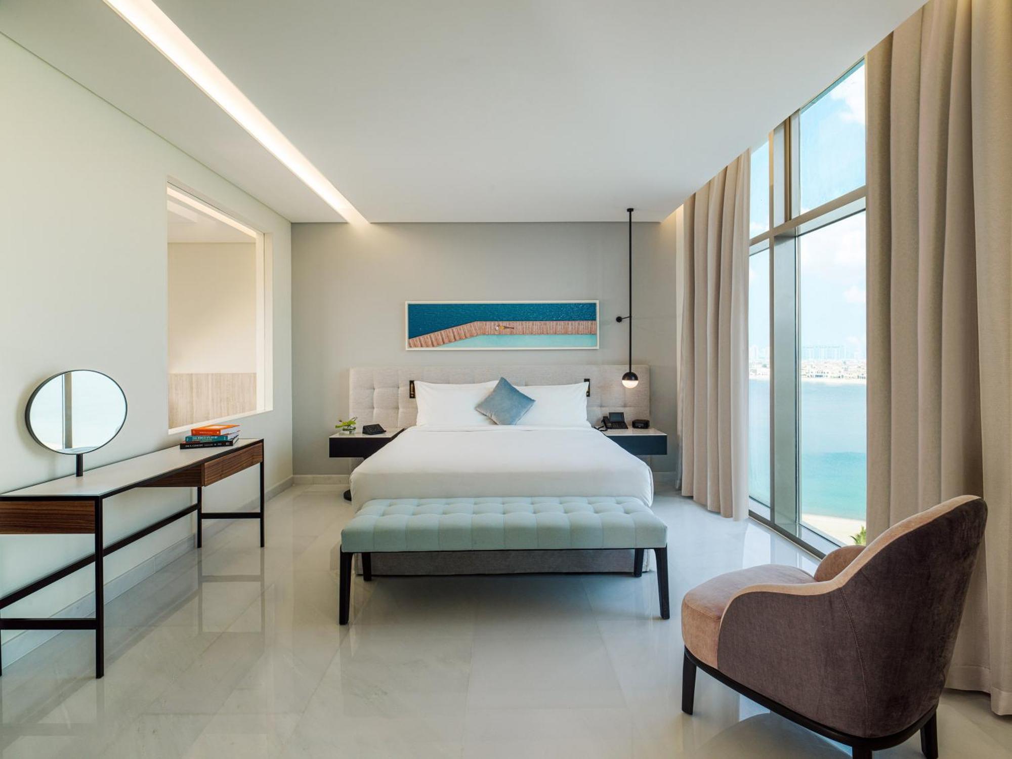 Th8 Palm Dubai Beach Resort, Vignette Collection By Ihg מראה חיצוני תמונה A bedroom at the hotel